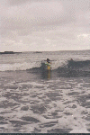 Kid in the waves